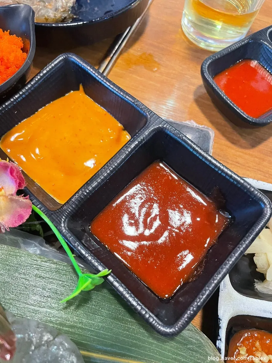 A drink enjoyed alongside the raw shrimp sashimi