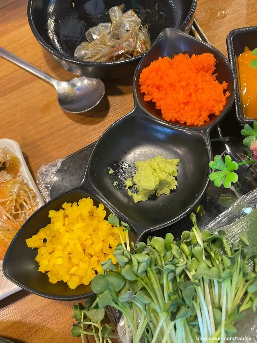 A drinking table set up alongside the raw shrimp sashimi