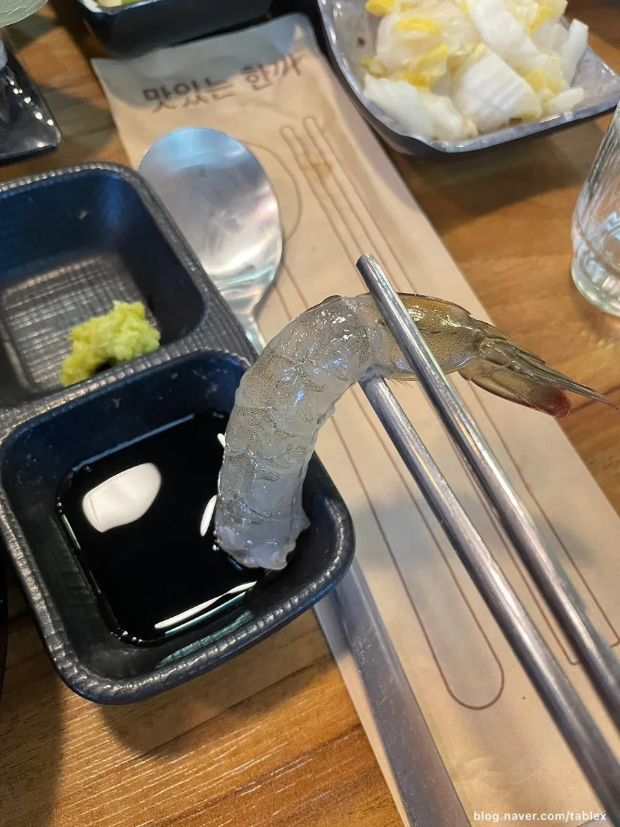 Two spicy sauces with pickled radish, wasabi, and flying fish roe