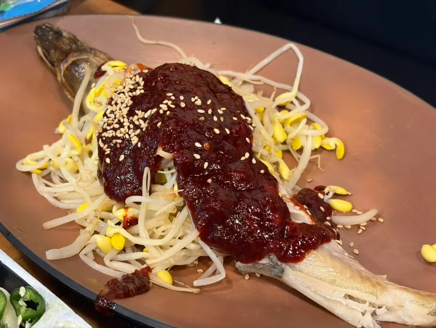 Complimentary butter-grilled shrimp heads