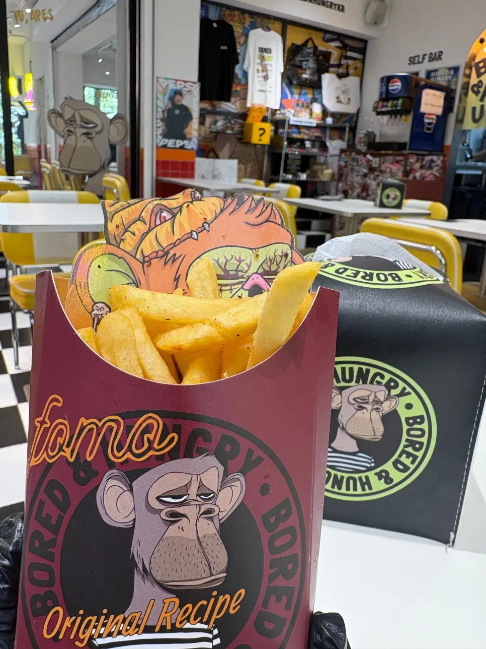 Character-printed burger wrapping and fries bag