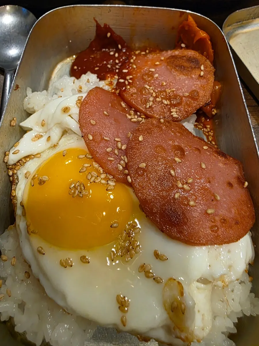 Lunchbox with sausage and stir-fried kimchi