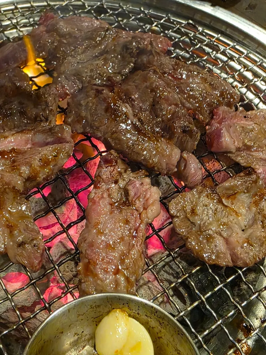 Rib meat cooking over charcoal