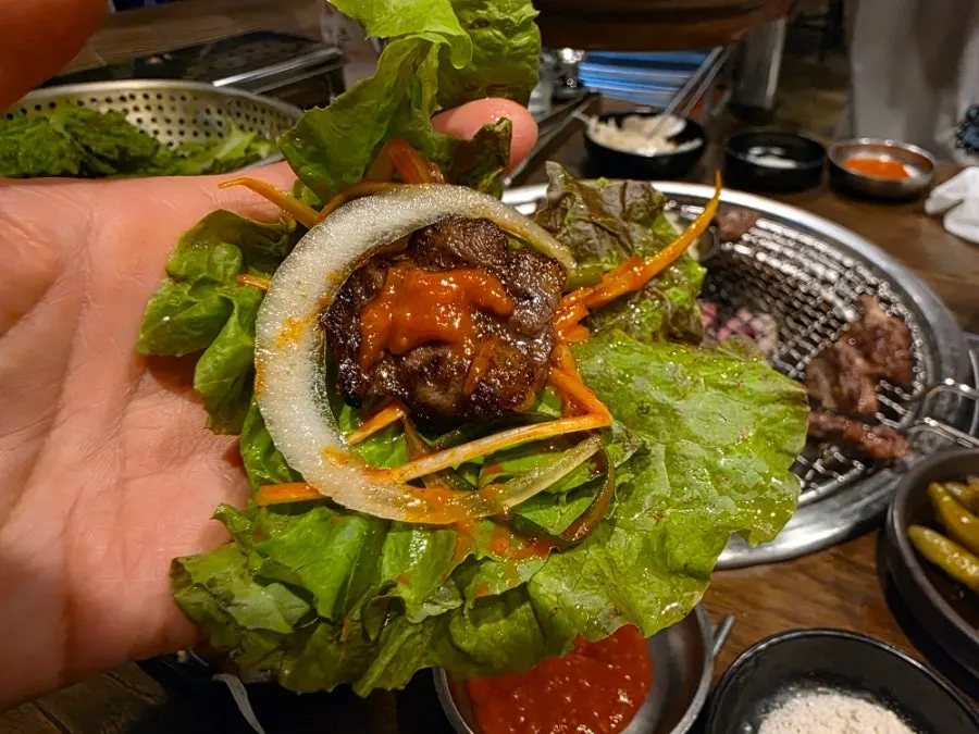 Galbisal served in a lettuce wrap