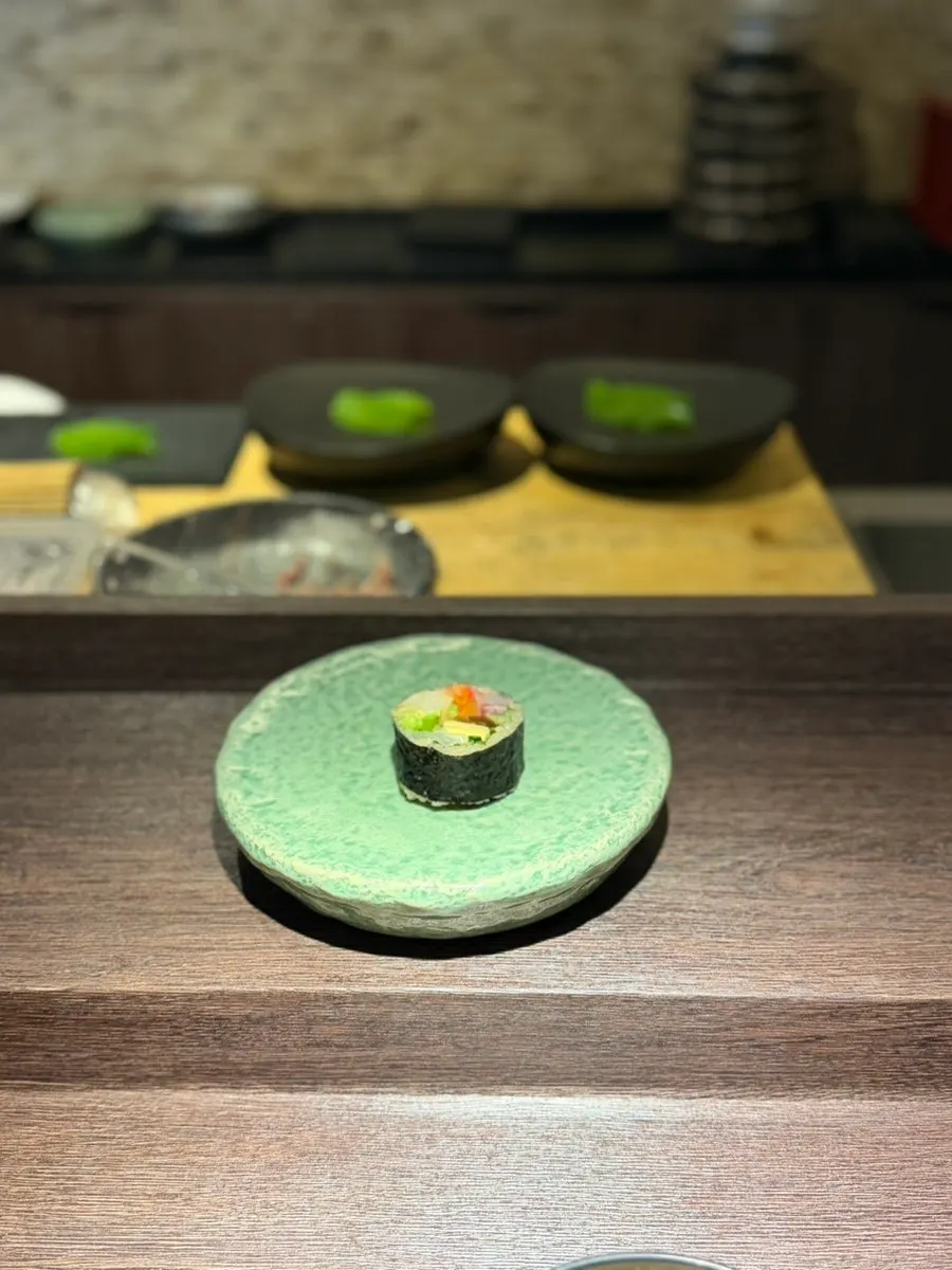 Negitoro sushi topped with gamtae seaweed