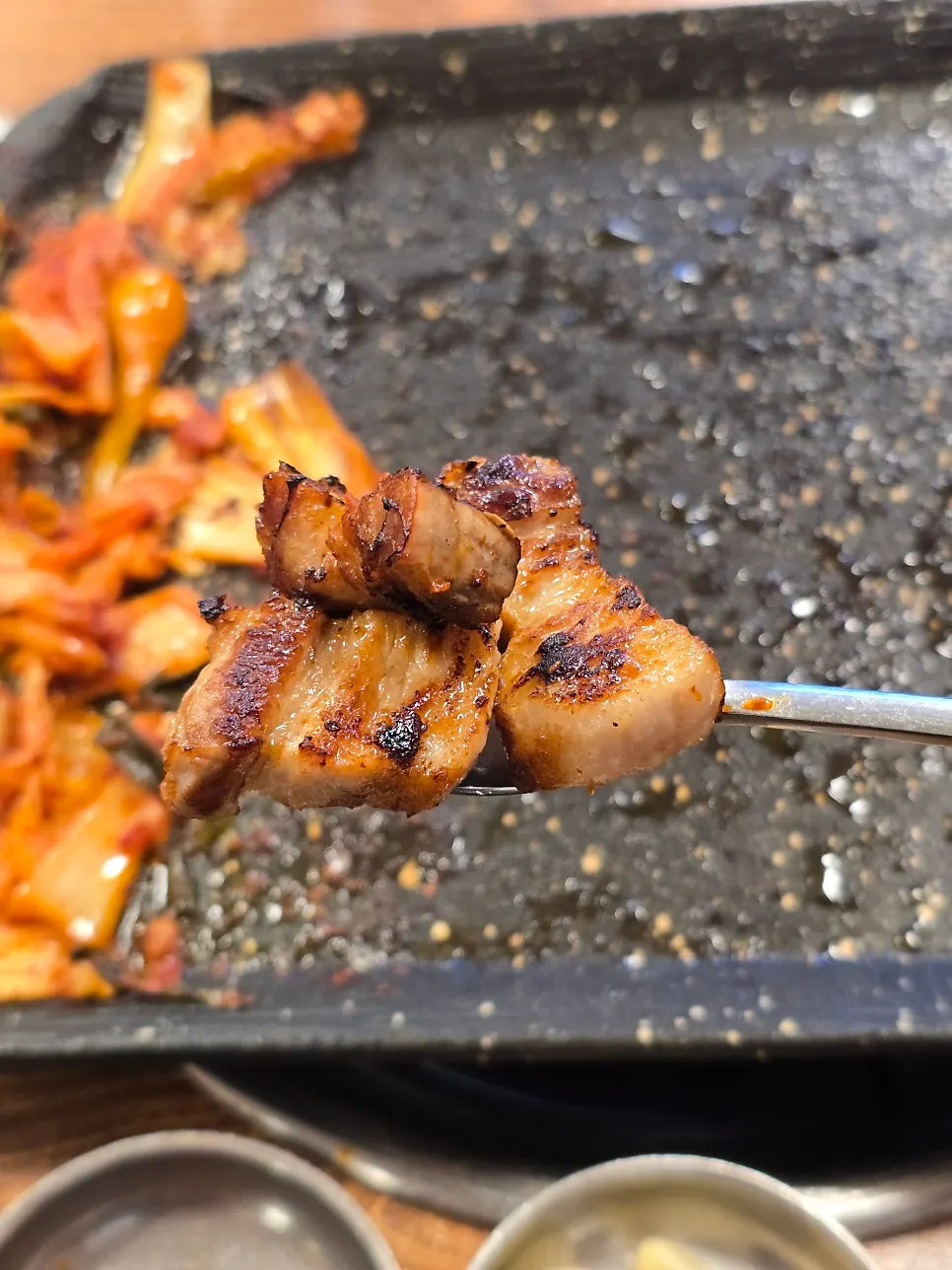 Green onion kimchi served with the meat
