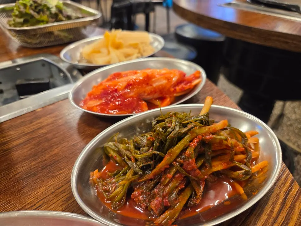 Standard side dish set of scallion kimchi, napa cabbage kimchi, and white kimchi