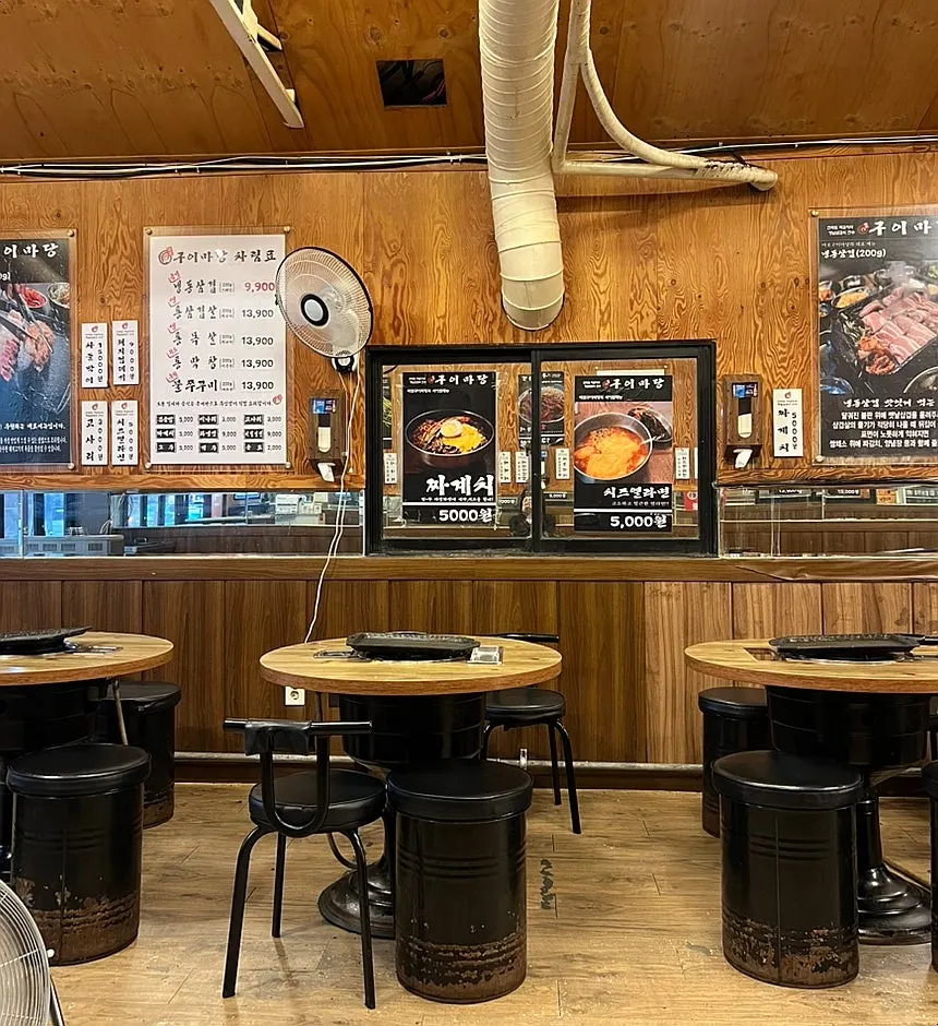 Interior of Mapo Gui Madang with round tables