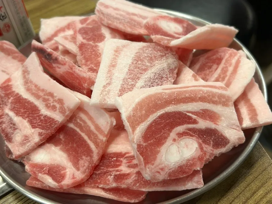 Frozen pork belly table setting ordered by two people