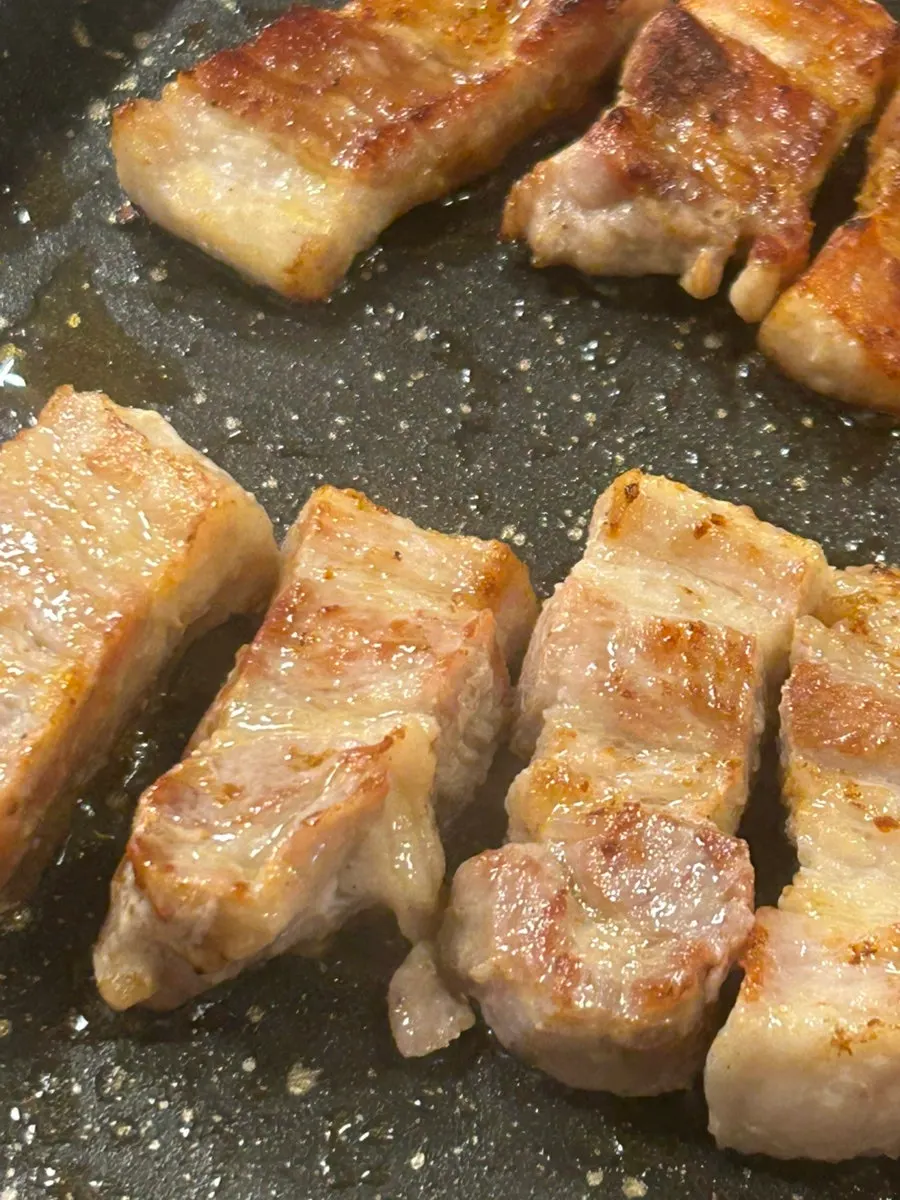 Grill full of meat cooking