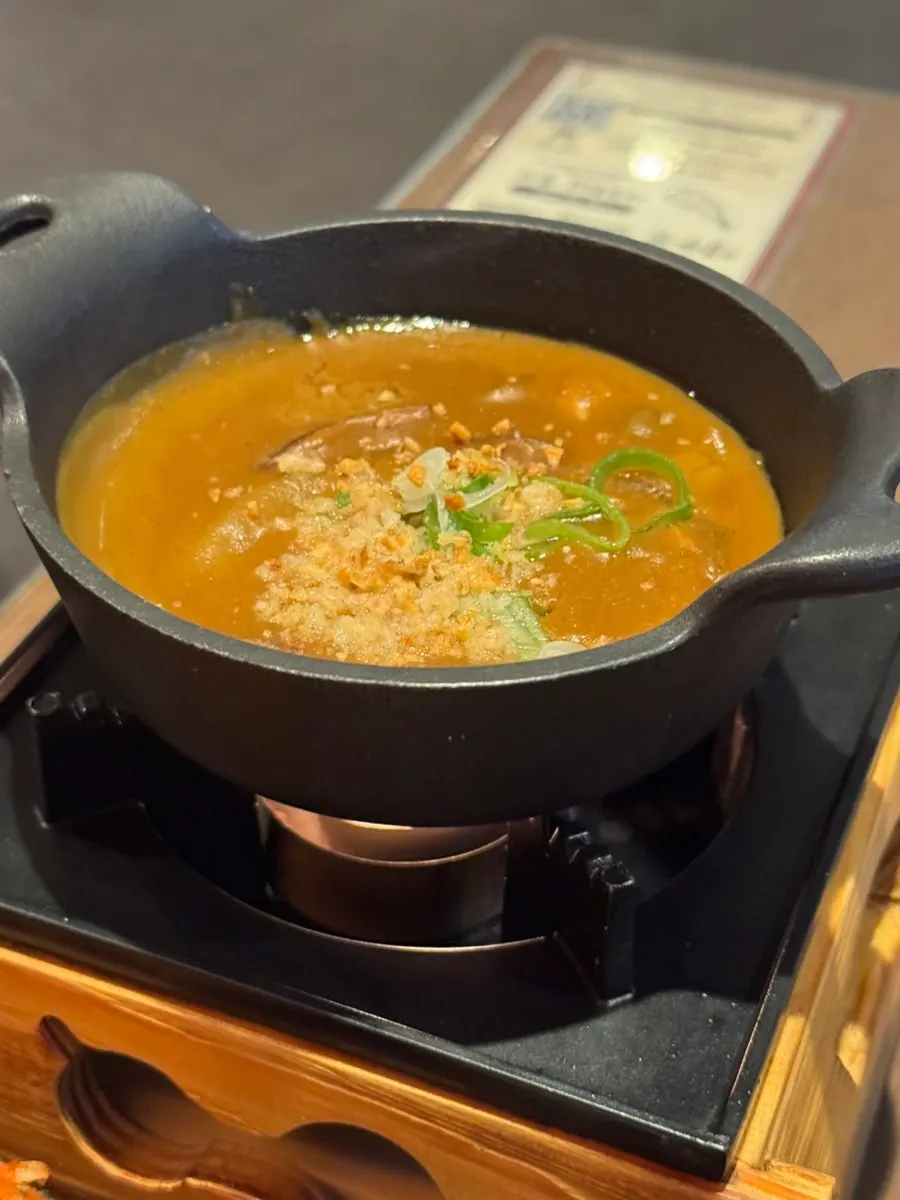 Bite-size curry ordered as an extra