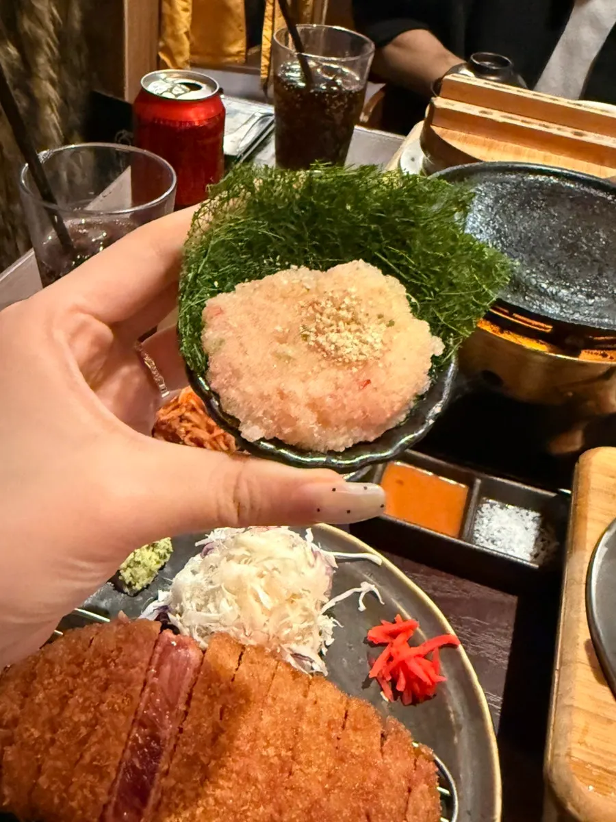 Cross-section of the sirloin gyukatsu, crispy outside and moist inside