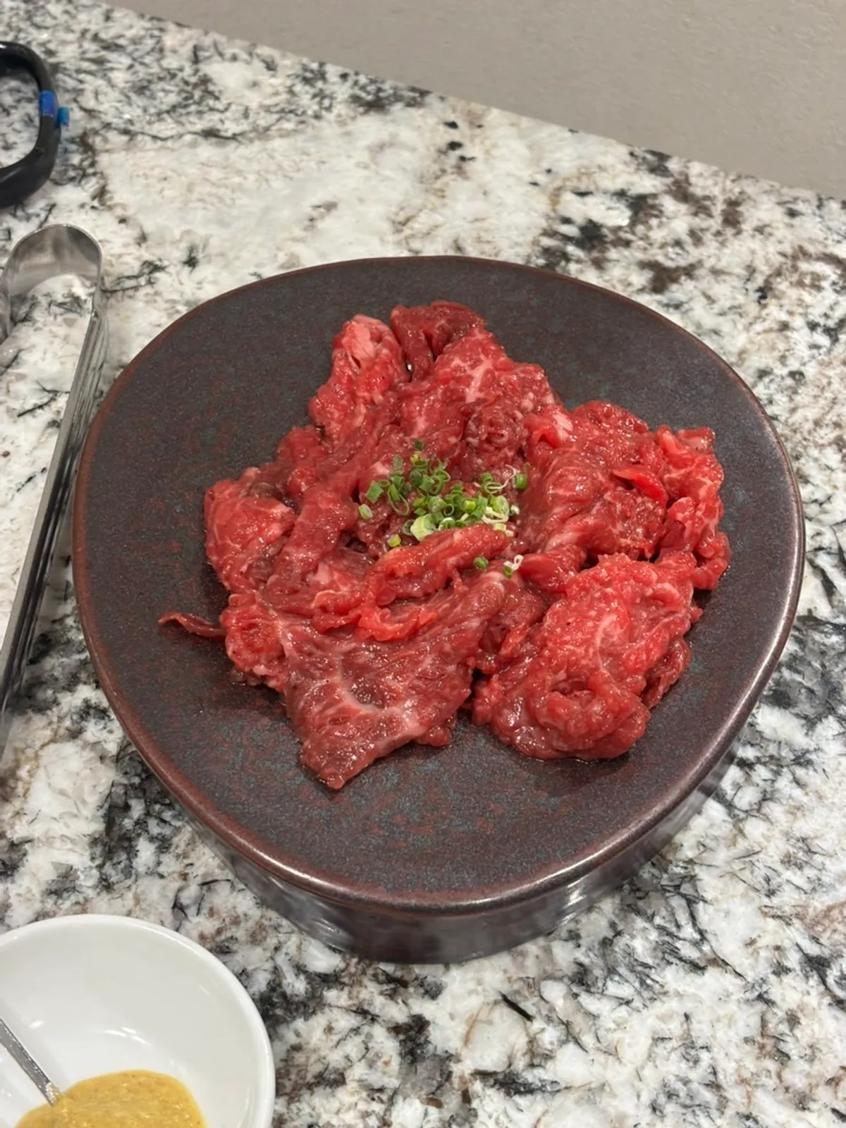 Table spread with charcoal-grilled seasoned hanwoo at Moyeon Mapo