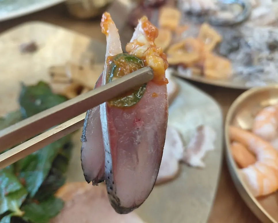 Sashimi platter with raw shrimp, gizzard shad and more