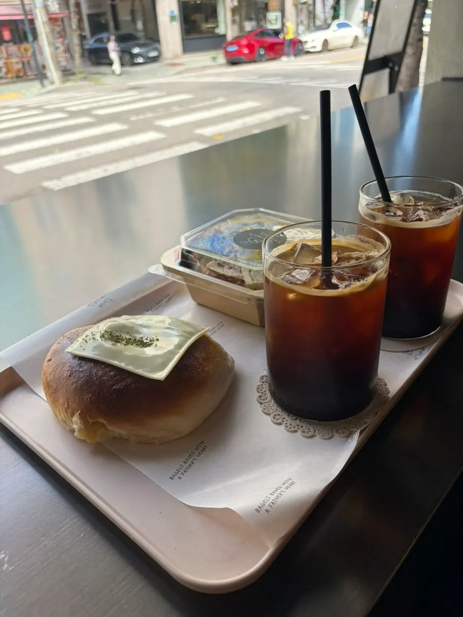 Handmade jambon sandwich, potato bagel, and iced Americano set