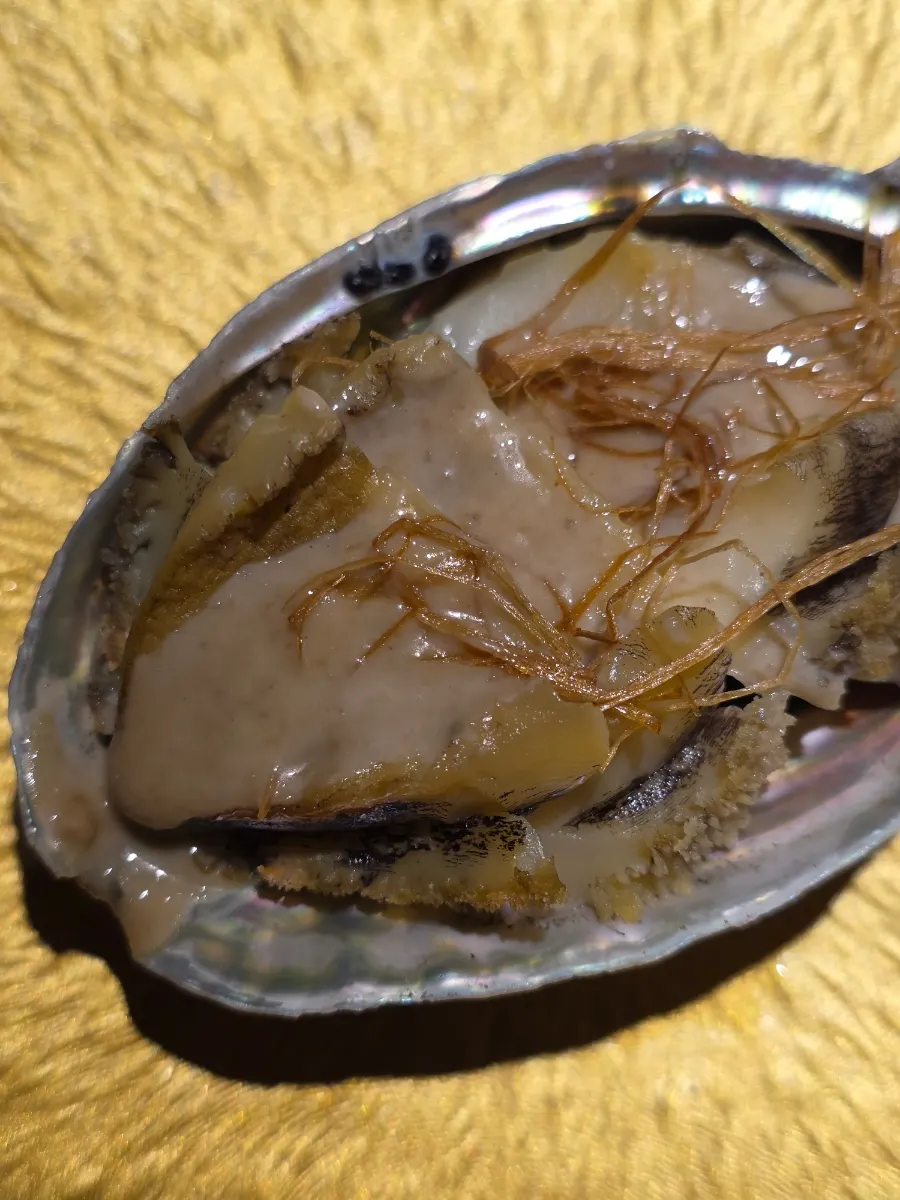 Steamed abalone served with snow crab innard sauce
