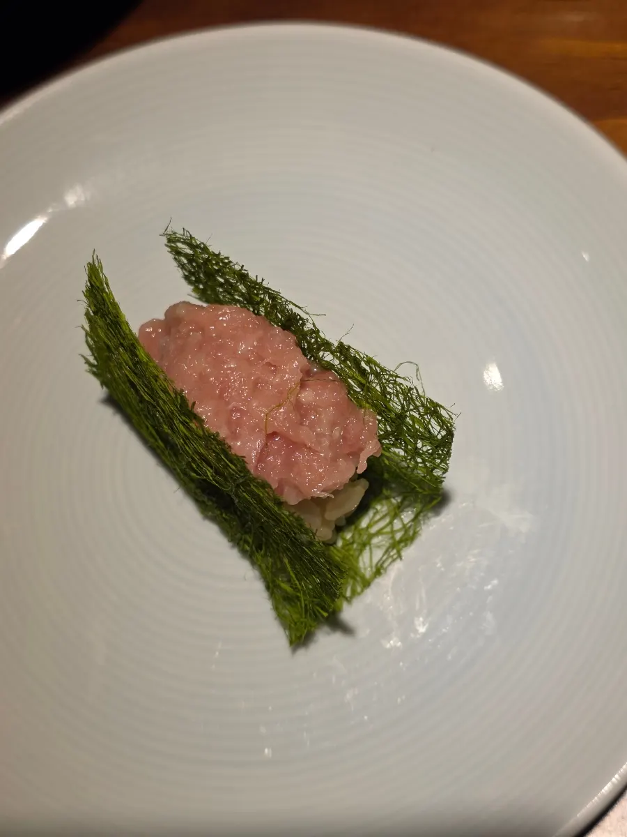 Negitoro sushi topped with gamtae seaweed