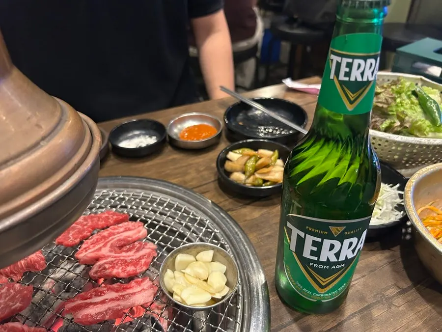 Rib meat placed on the charcoal grill
