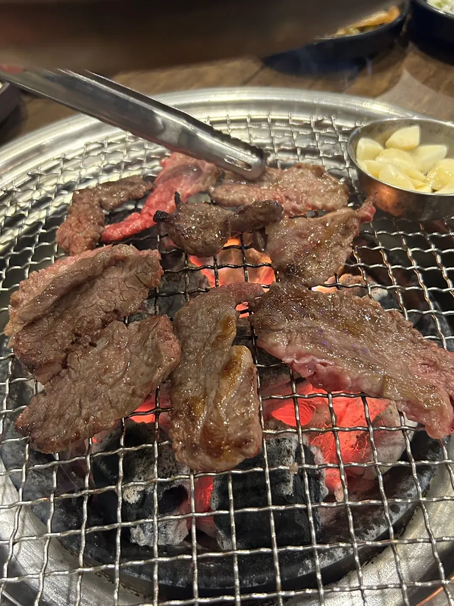 Rib meat cooking on the grill