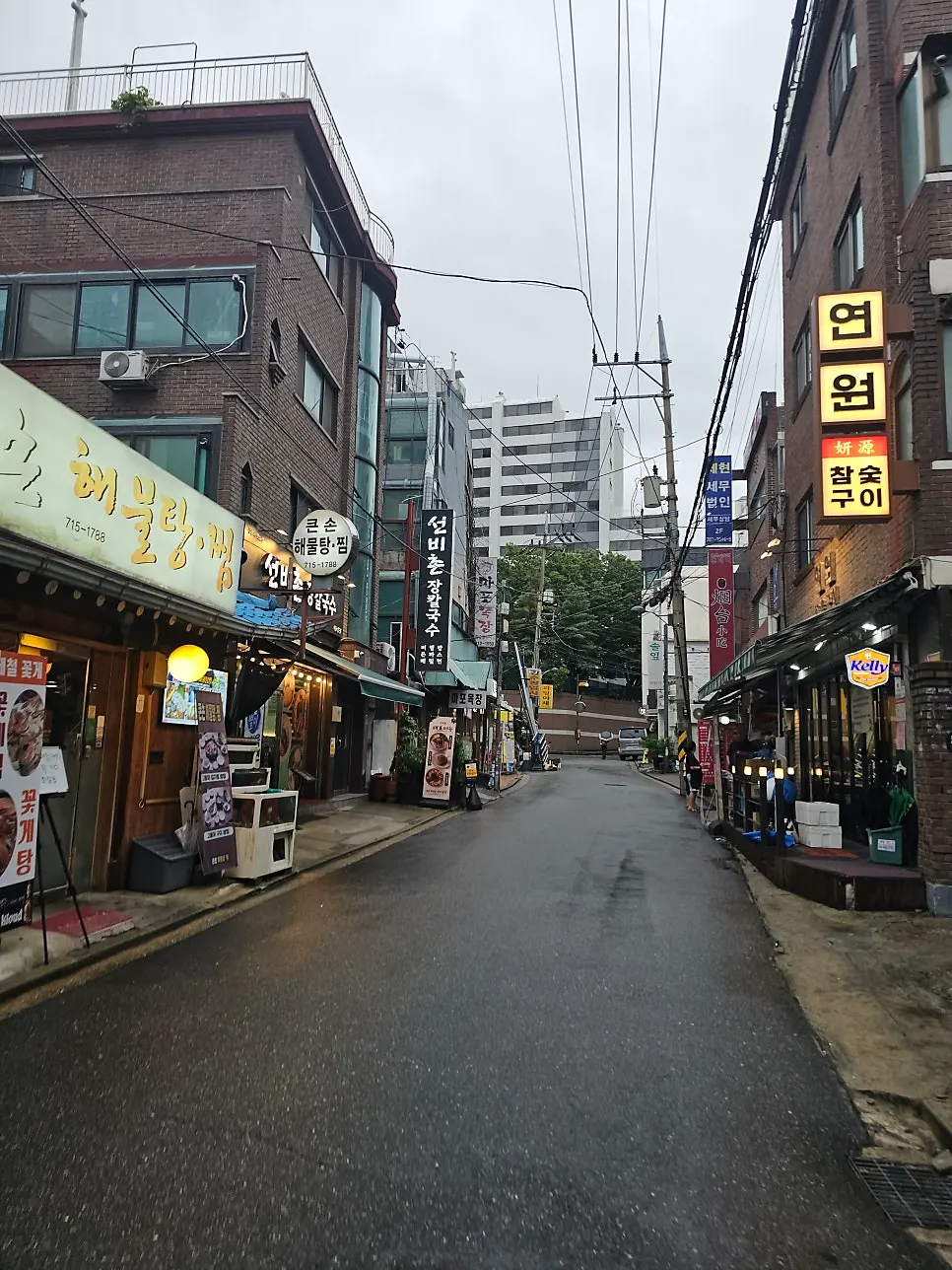 Mapo Mokjang's exterior with the cow character sign