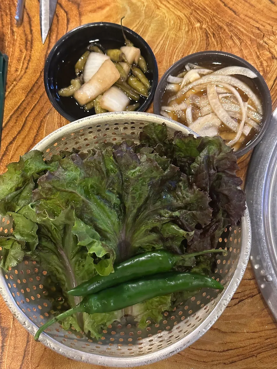 Basic side dishes: lettuce, pickles, and onion sauce