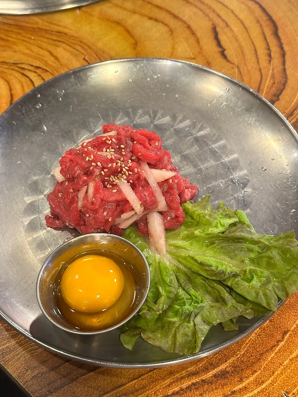 200g beef tartare topped with an egg yolk