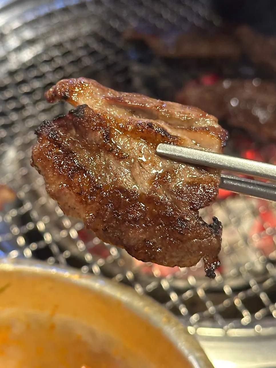Premium beef ribs grilled over charcoal