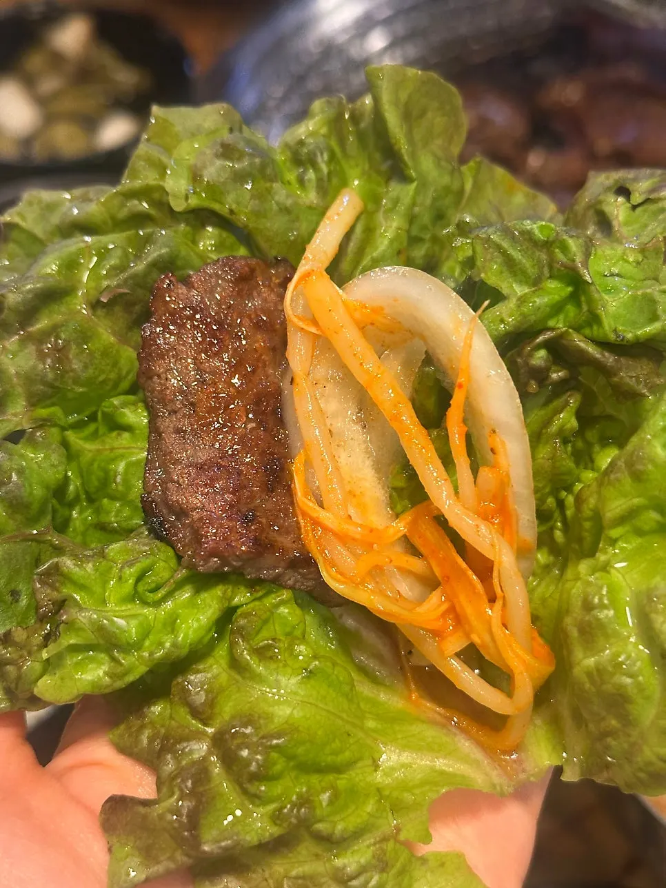 Marinated premium beef ribs wrapped in lettuce