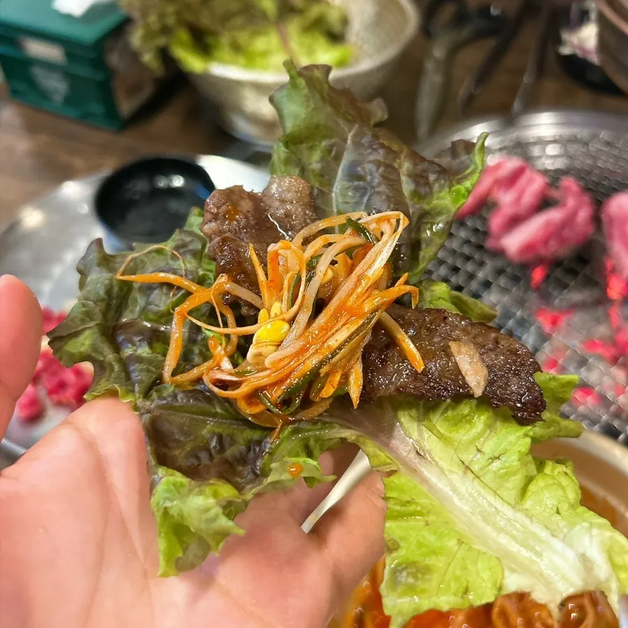 A piece of plain rib meat with a smoky char