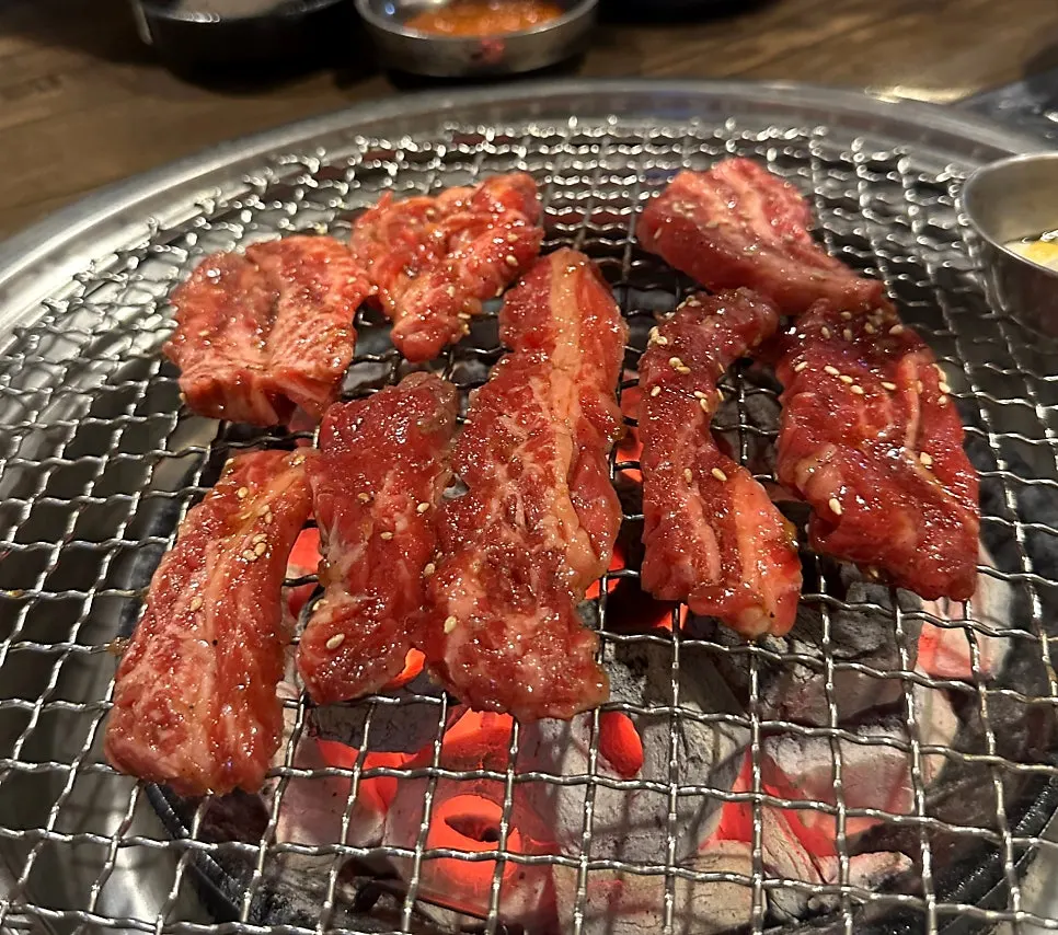 Marinated rib meat placed on the charcoal grill