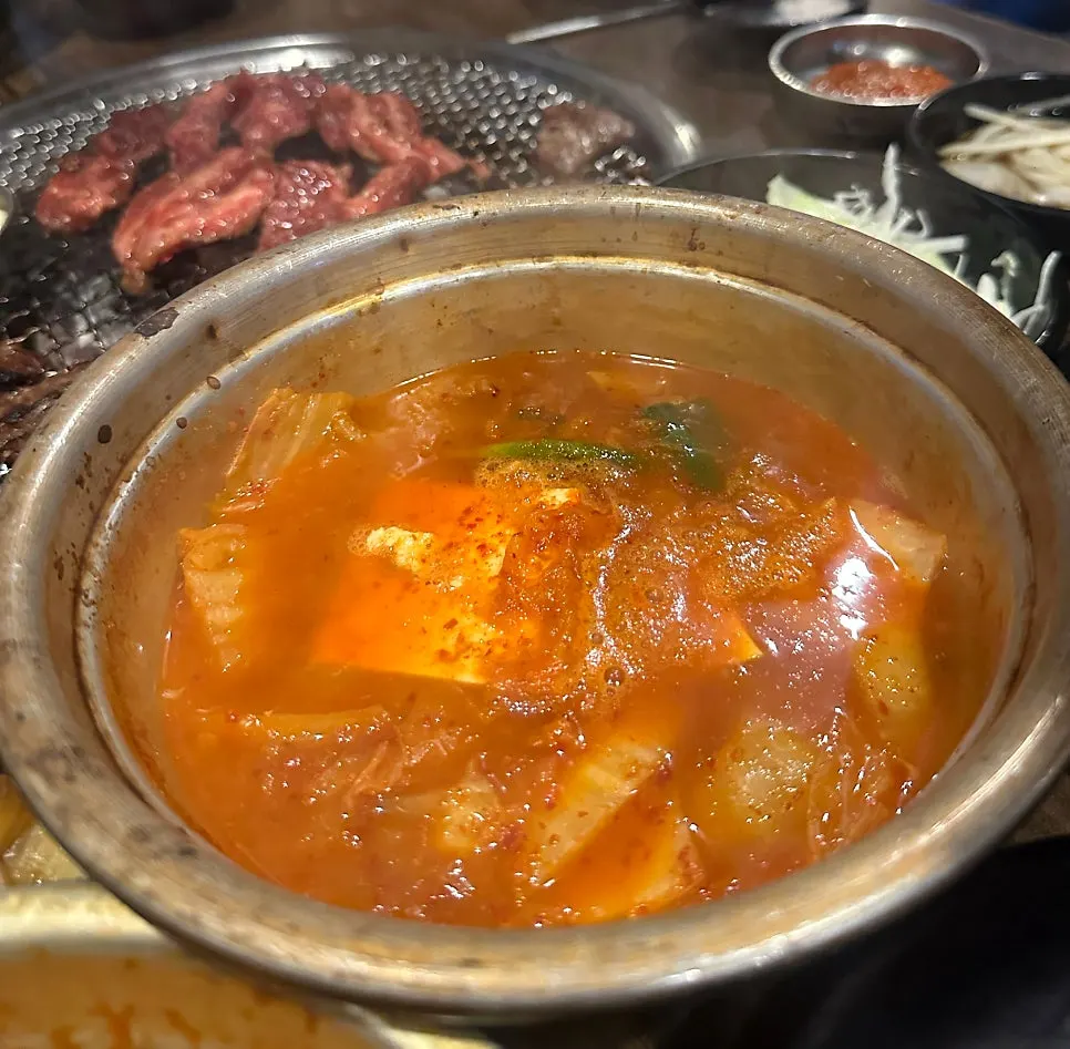 The complimentary kimchi stew served at Mapo Mokjang