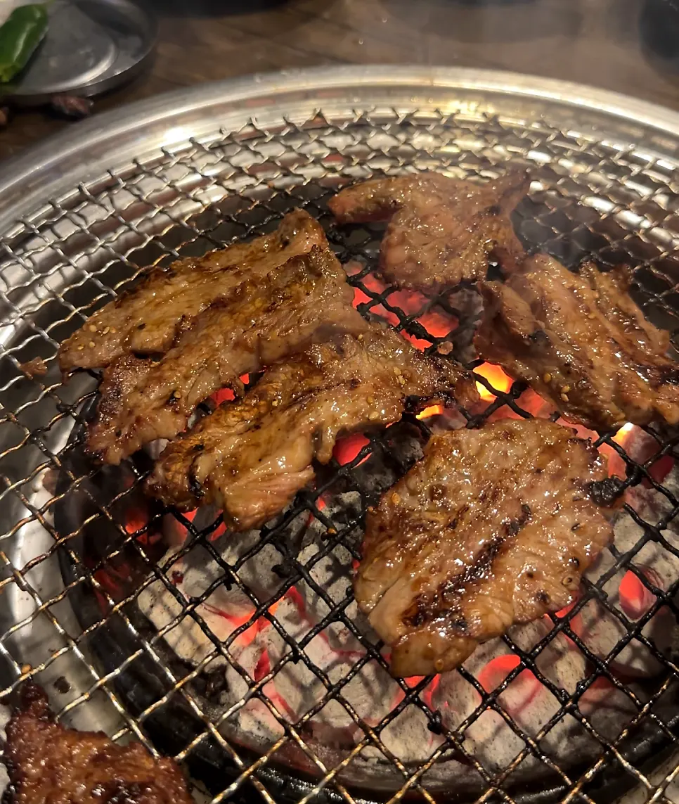 Marinated rib meat still remaining on the grill at Mapo Mokjang