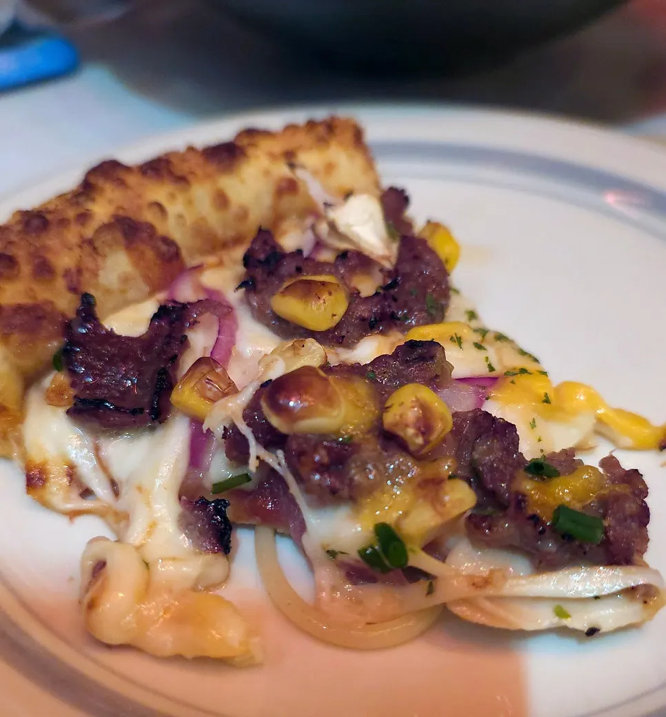 Bulgogi pizza piled with meat topping
