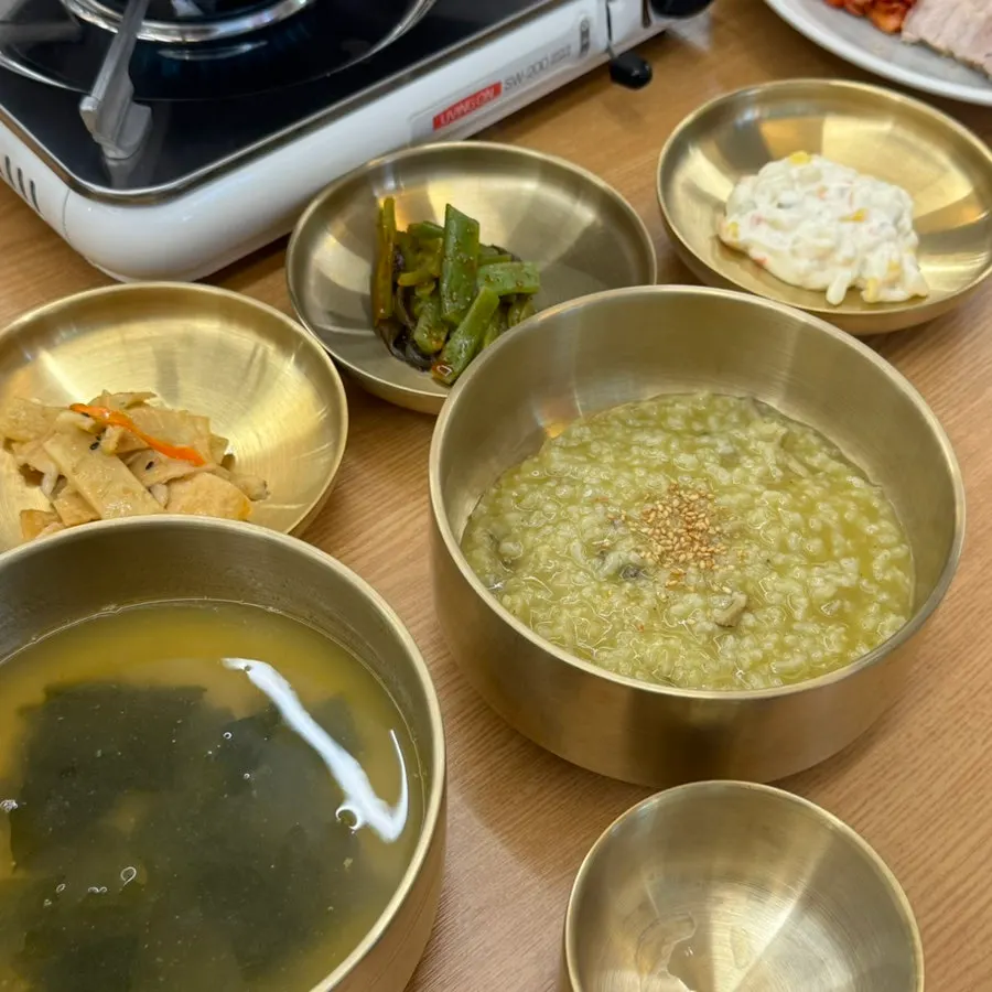 Abalone innards porridge and side dishes from the Signature Feast