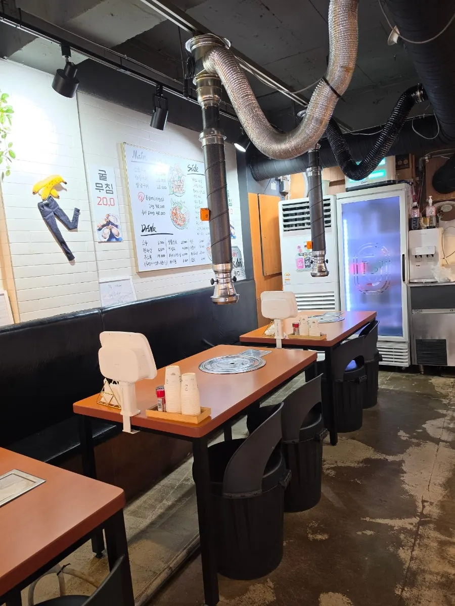 Clean dining hall with multiple tables