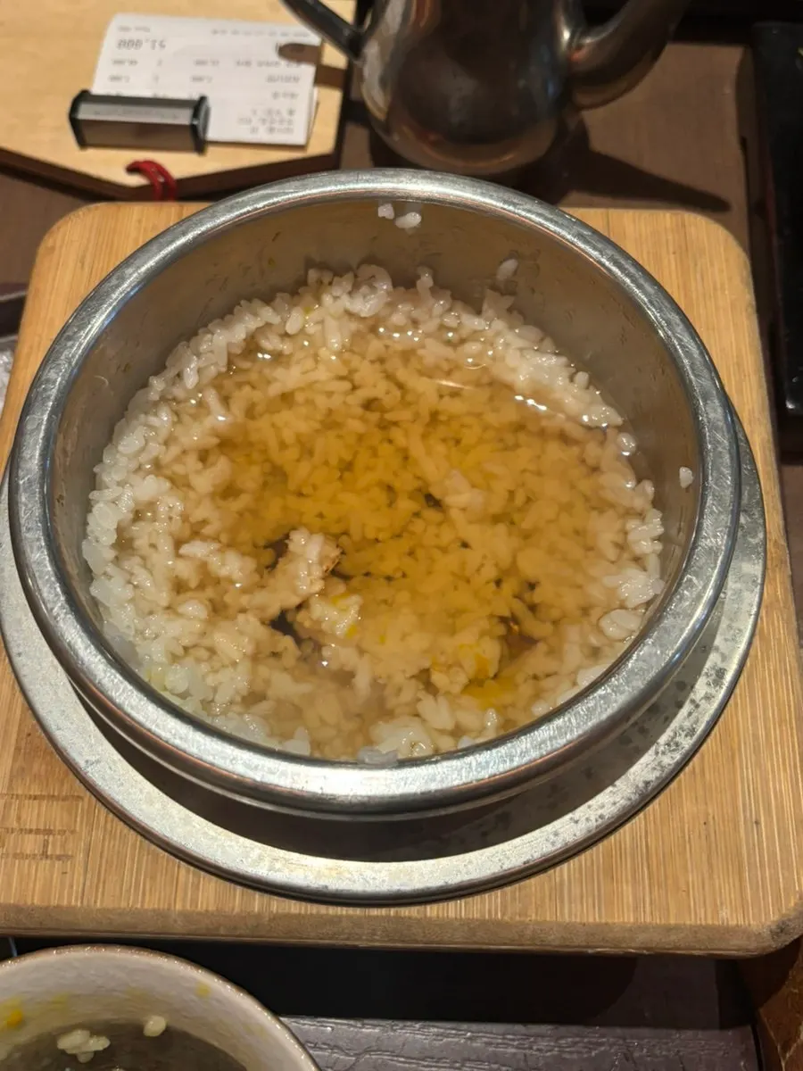 Pot-cooked rice mixed with onsen tamago
