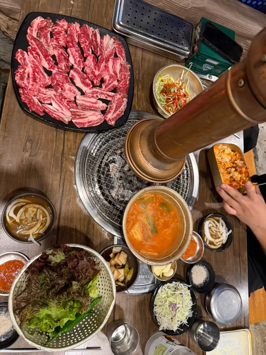Free kimchi stew and side dishes served by default