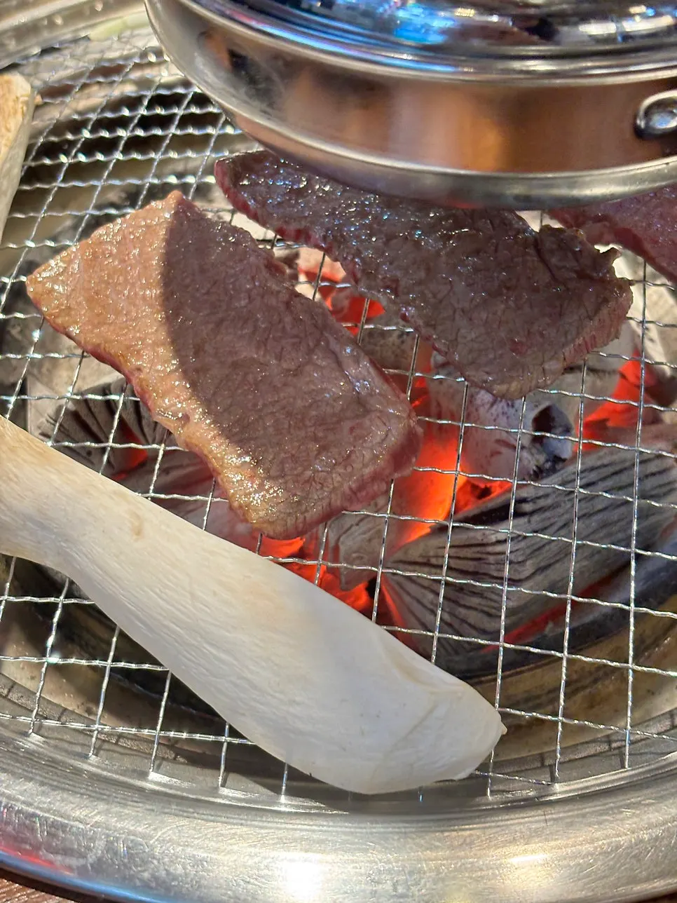 Grilling meat cooking on the pan