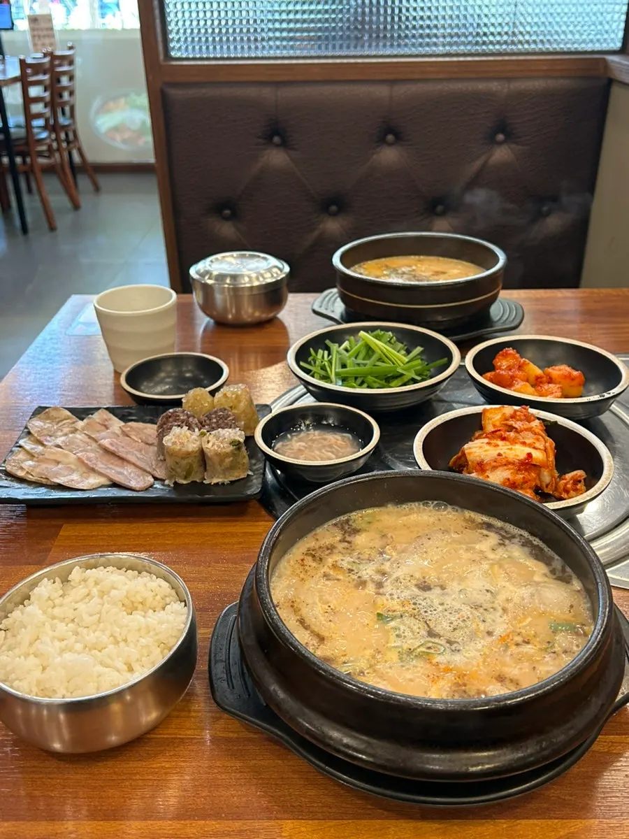 Finishing a gukbap meal at Bosseung Hoegwan Mapo Branch