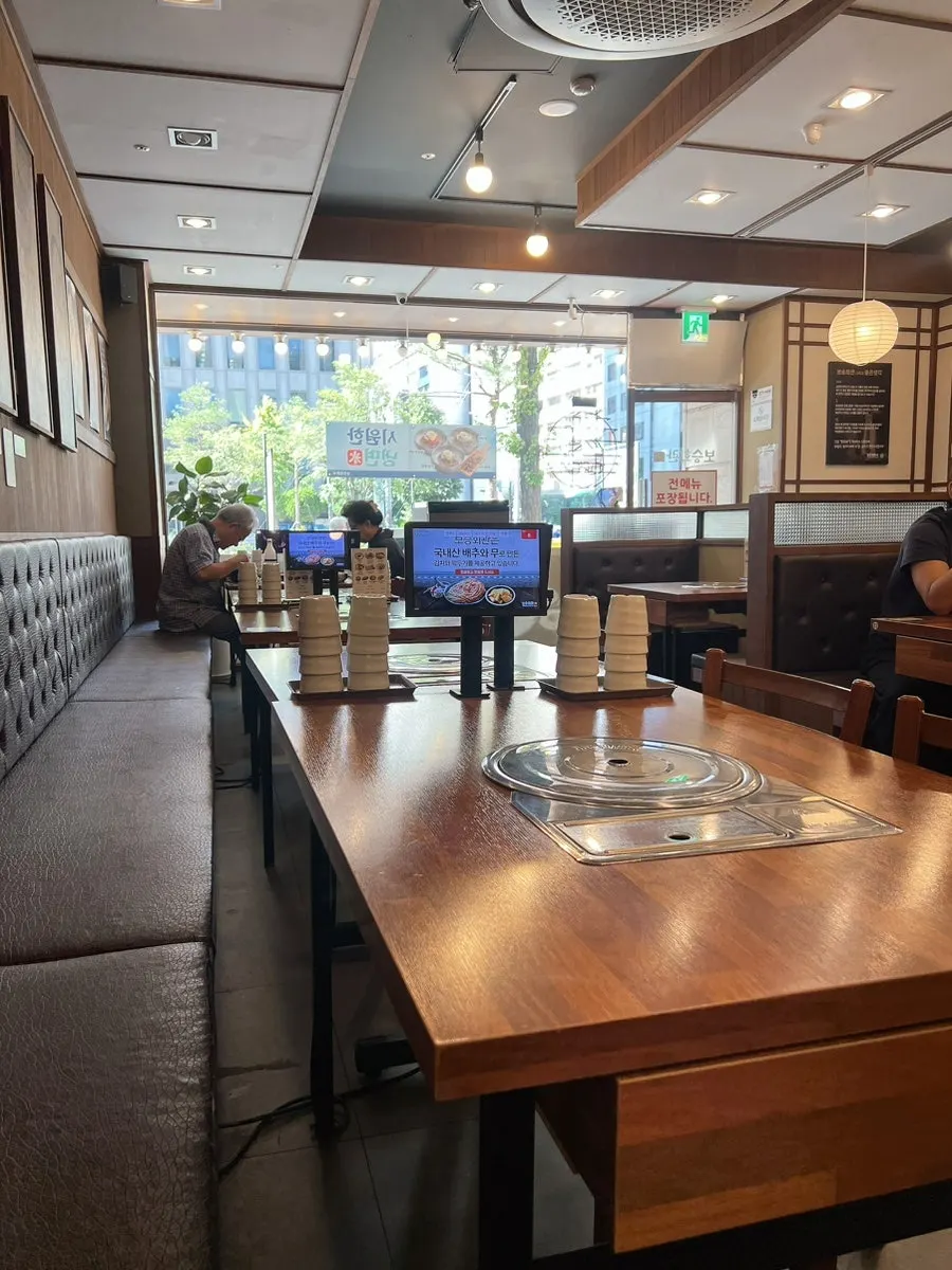 Clean table in the modern interior of the gukbap restaurant