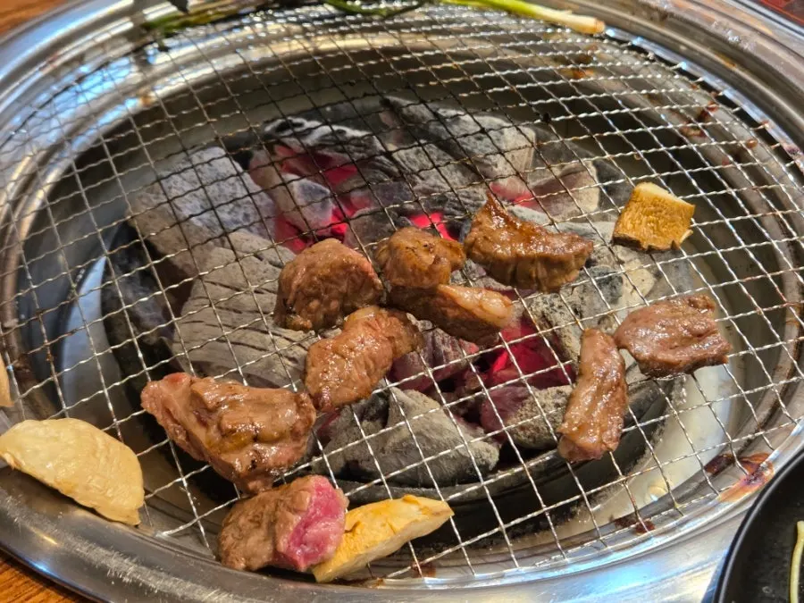 Cooked marinated ribs with grilled mushrooms