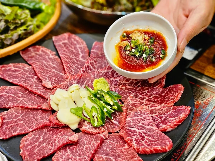 Glistening crimson-colored yuksashimi