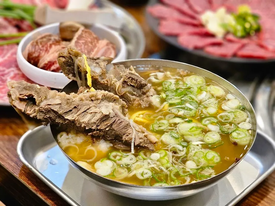 Flower kkalbitang served on a tray