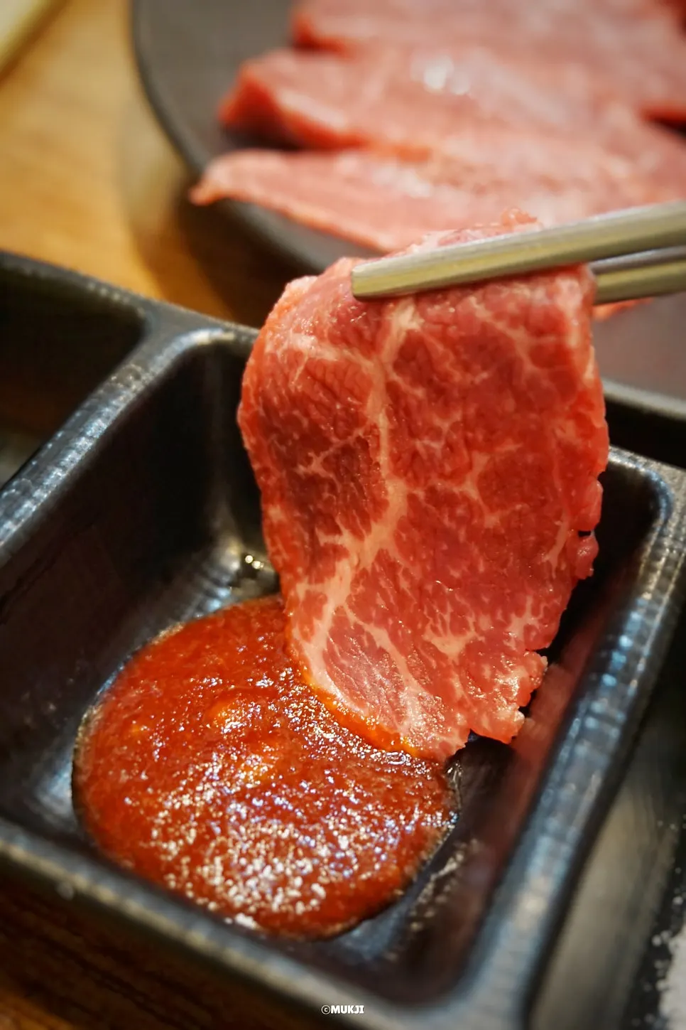 Marbled yuksashimi (raw beef sashimi) at Usijang Hoegwan