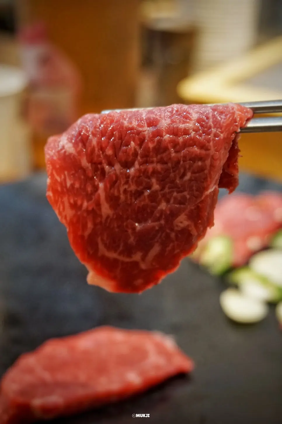 Spicy gochujang-based dedicated sauce served with the yuksashimi