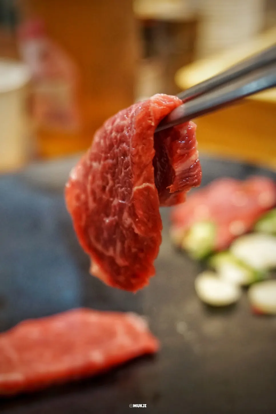 A thick-cut slice of yuksashimi