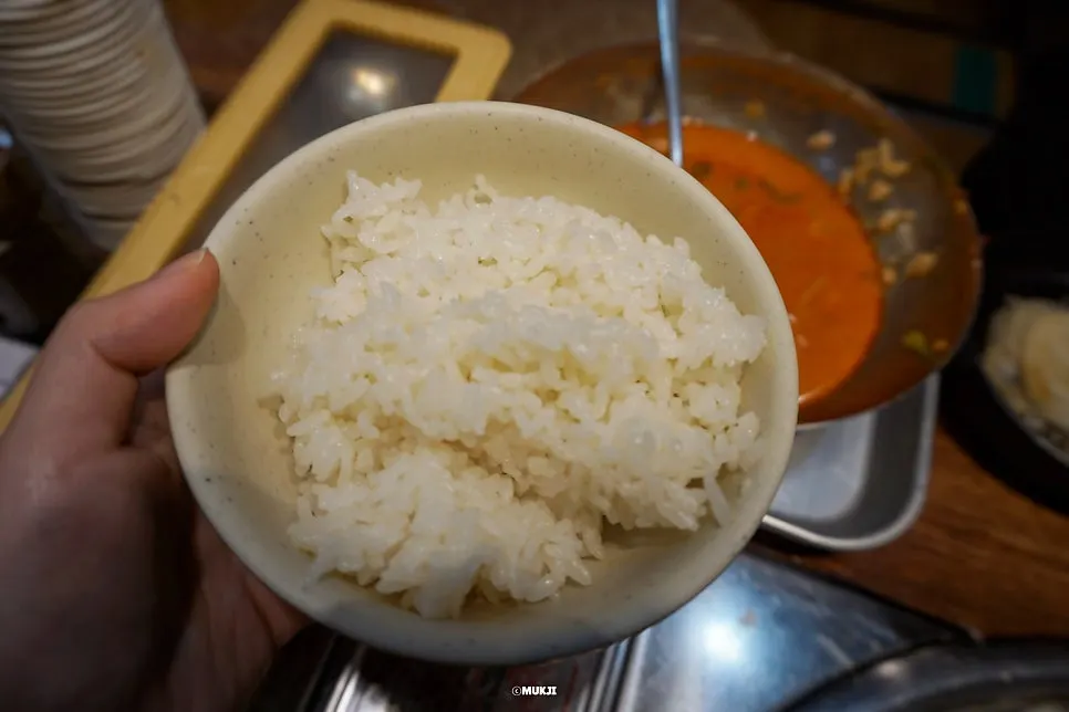 Spicy gukbap served with rice already mixed into the broth