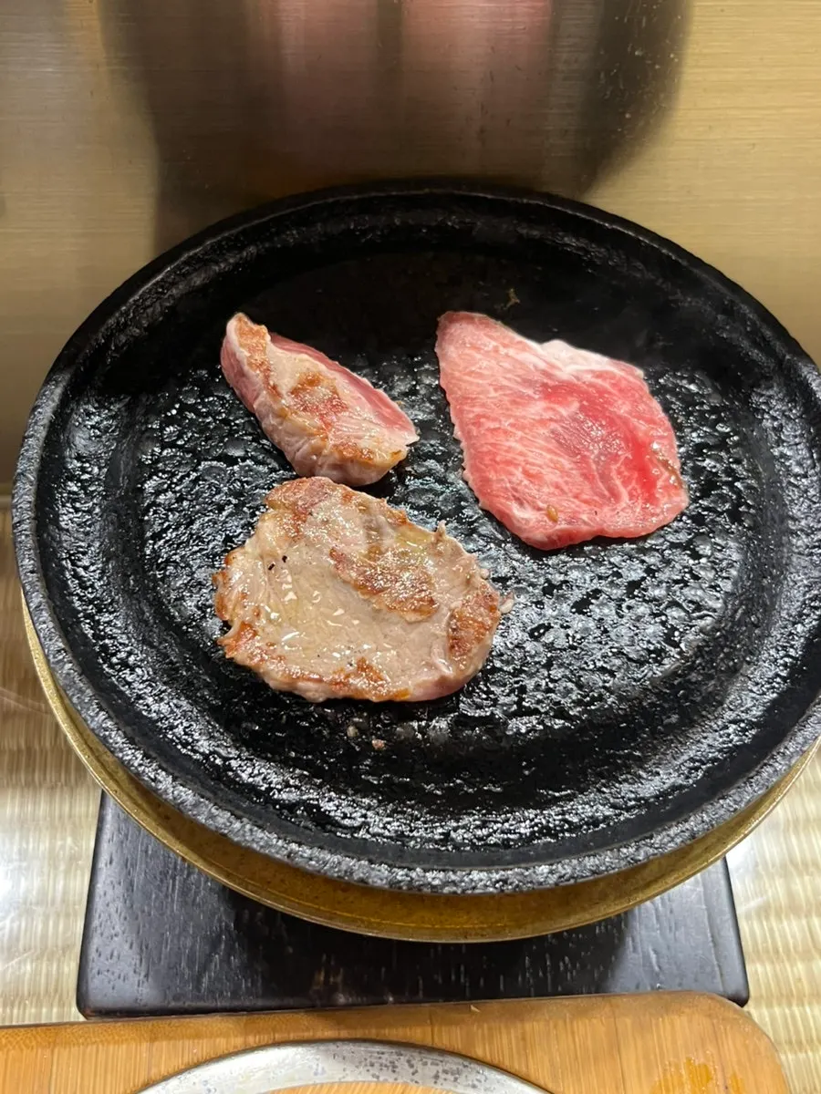 A bite of grilled yakiniku