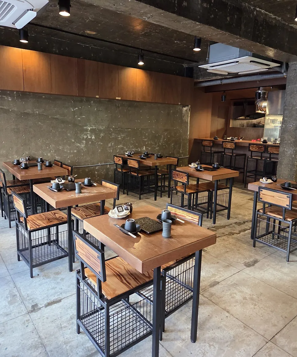 Table seating inside Yakitori Shomong