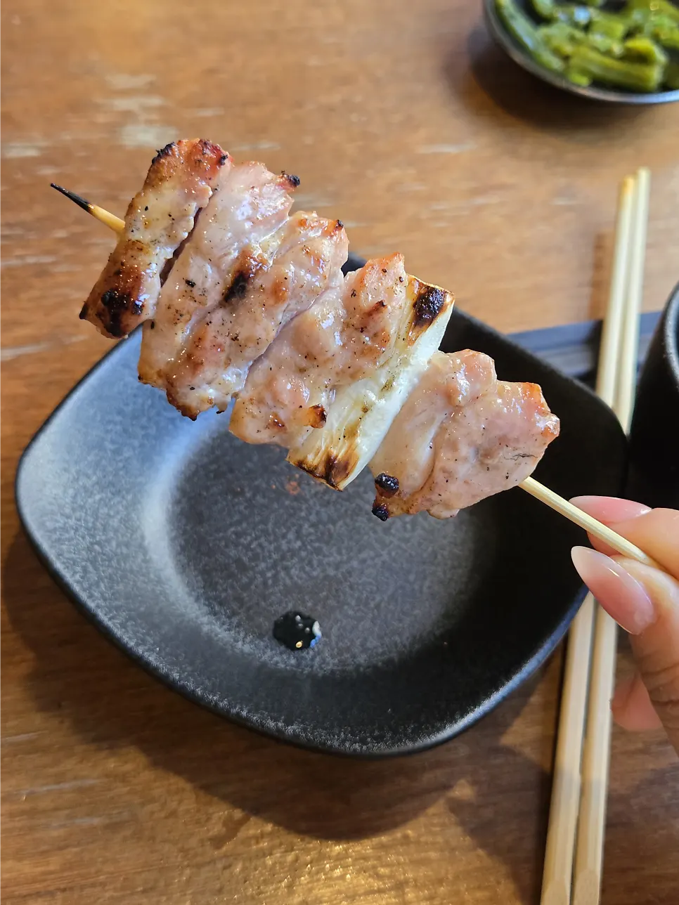 Charcoal-scented negima yakitori